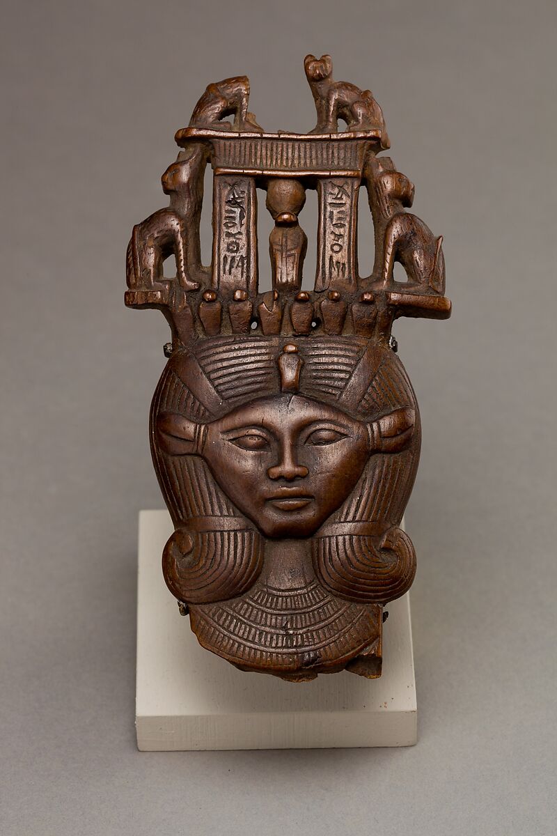 Head of Hathor from a clapper the inscription calling the musician who used it "beloved by  the goddess Mut , Lady of Isheru  (Karnak), Possibly boxwood