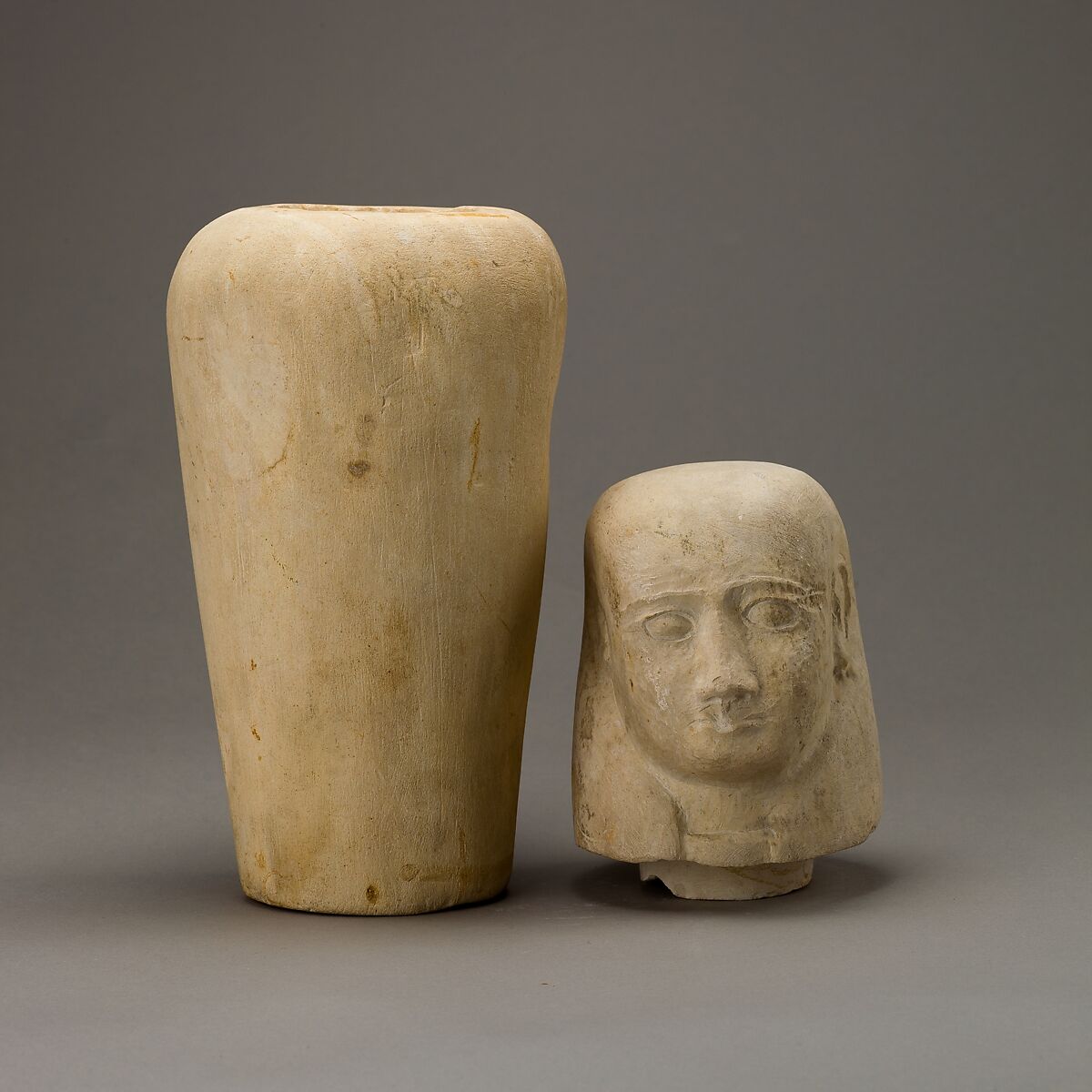 Canopic jar with human head, Limestone