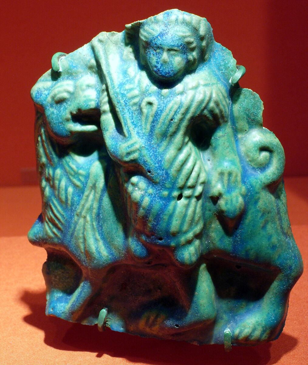 Plaque Depicting a God(?) Riding a Lion, Faience, blue 