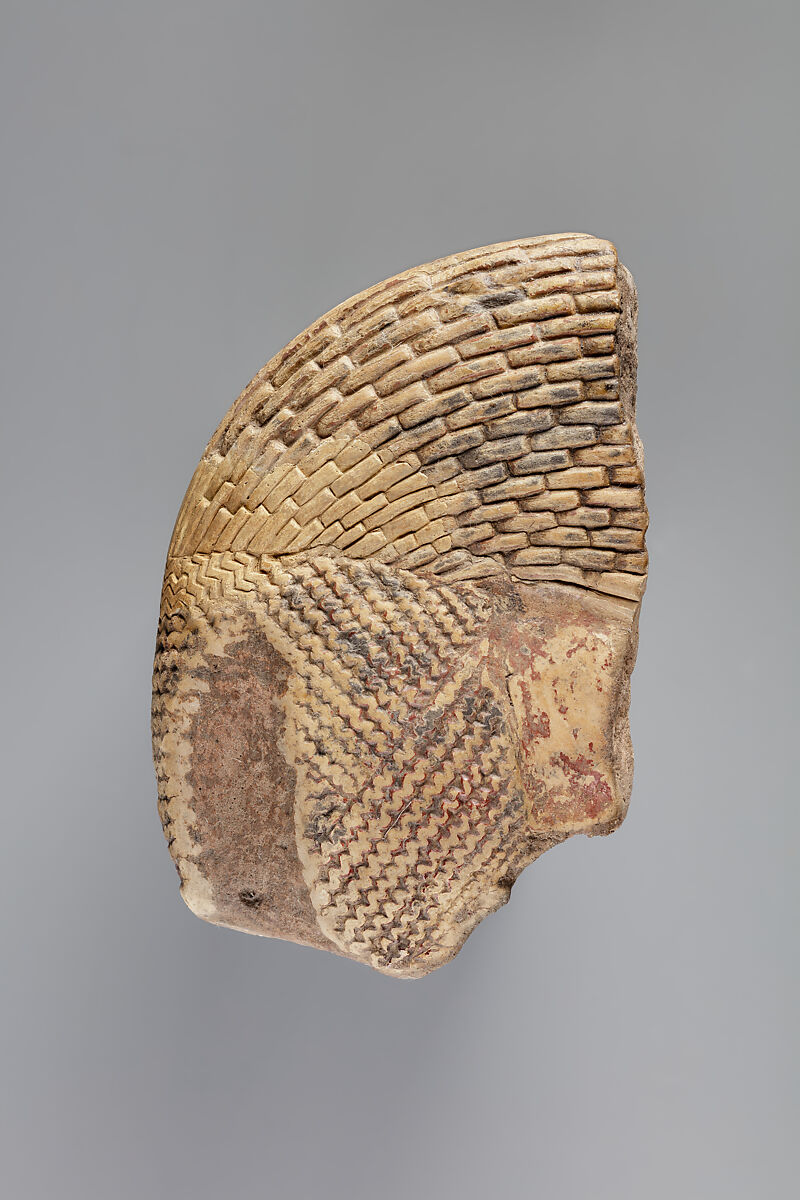 Tile fragment, part of a wig from a figure of the king, Faience 
