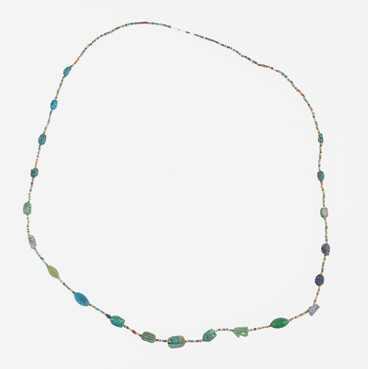 Amulets and string of beads, Faience, glazed steatite