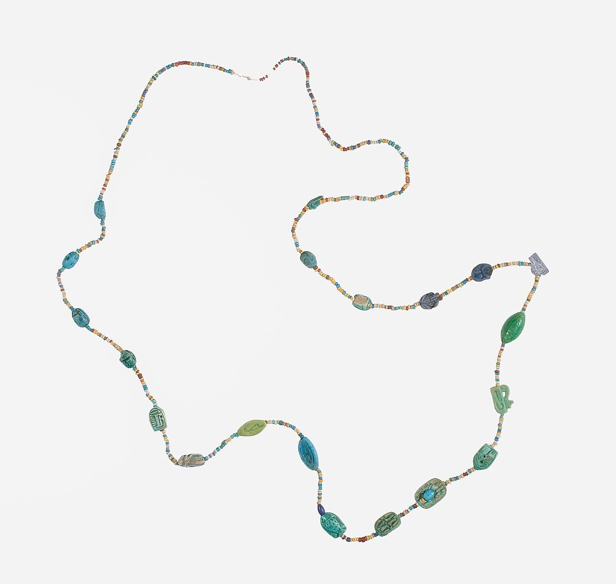 Amulets and string of beads, Faience, glazed steatite 