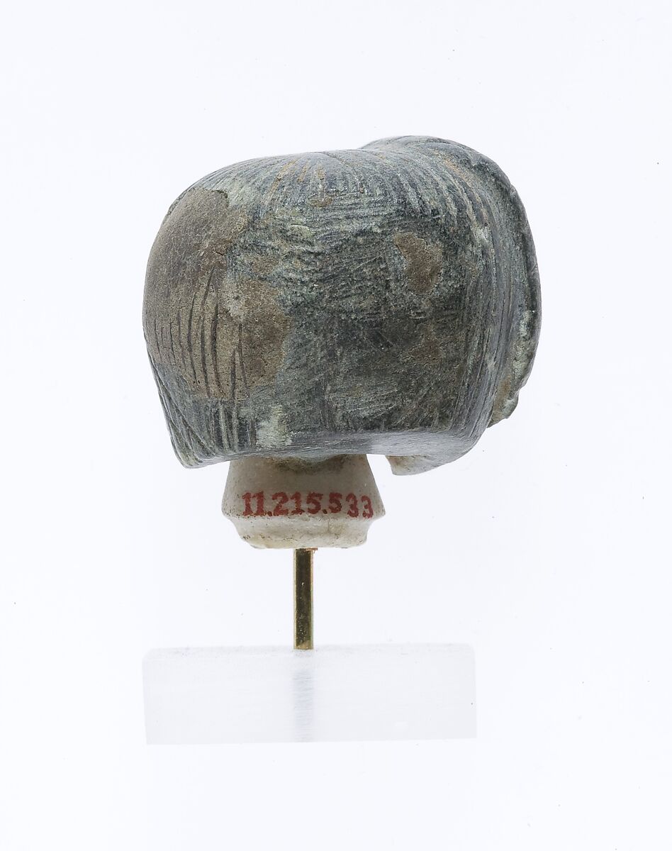 Head from a Spoon in the form of a Swimming Girl, Travertine (Egyptian alabaster), steatite