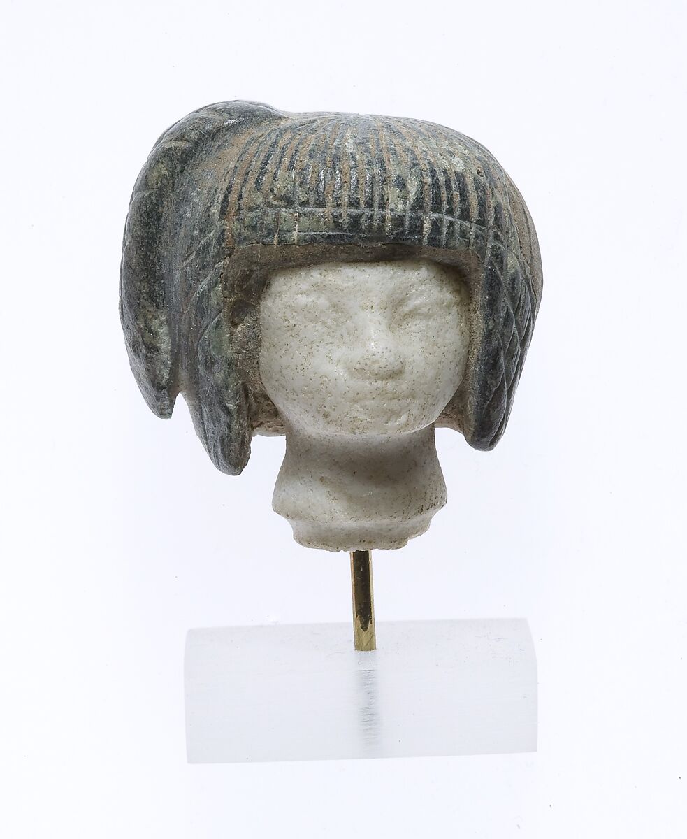 Head from a Spoon in the form of a Swimming Girl, Travertine (Egyptian alabaster), steatite