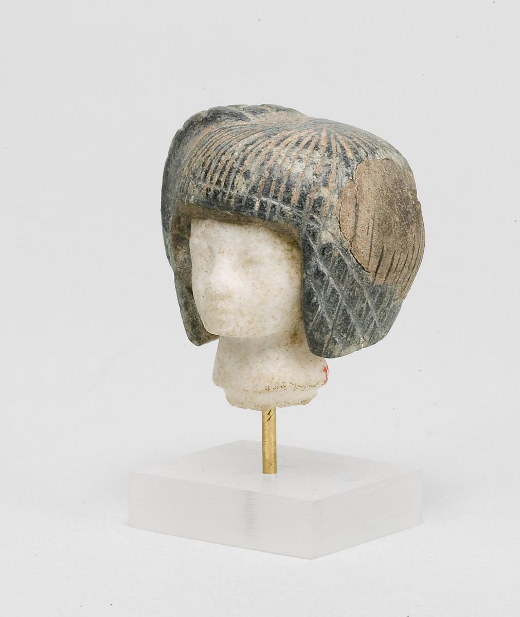 Head from a Spoon in the form of a Swimming Girl, Travertine (Egyptian alabaster), steatite