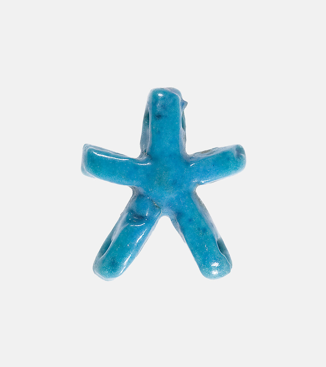 Jewelry element in the shape of a star, Faience 