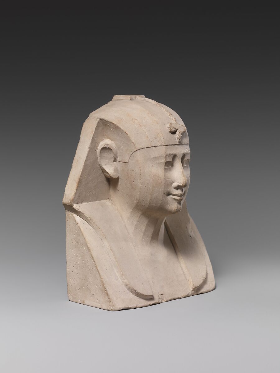 Bust of a royal figure with downward-hanging snake, Limestone