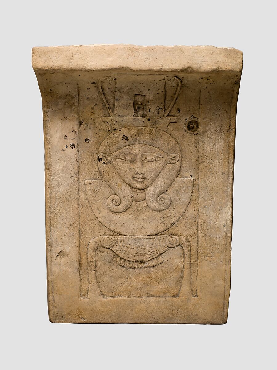 Relief plaque of Hathor emblem, curved as if from a temple frieze, Limestone