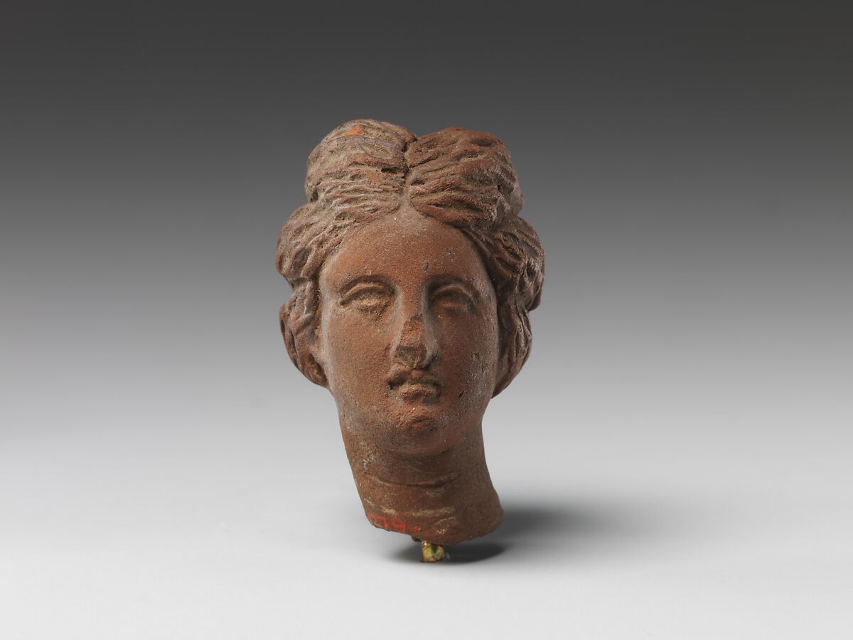 Head of a woman, Pottery 