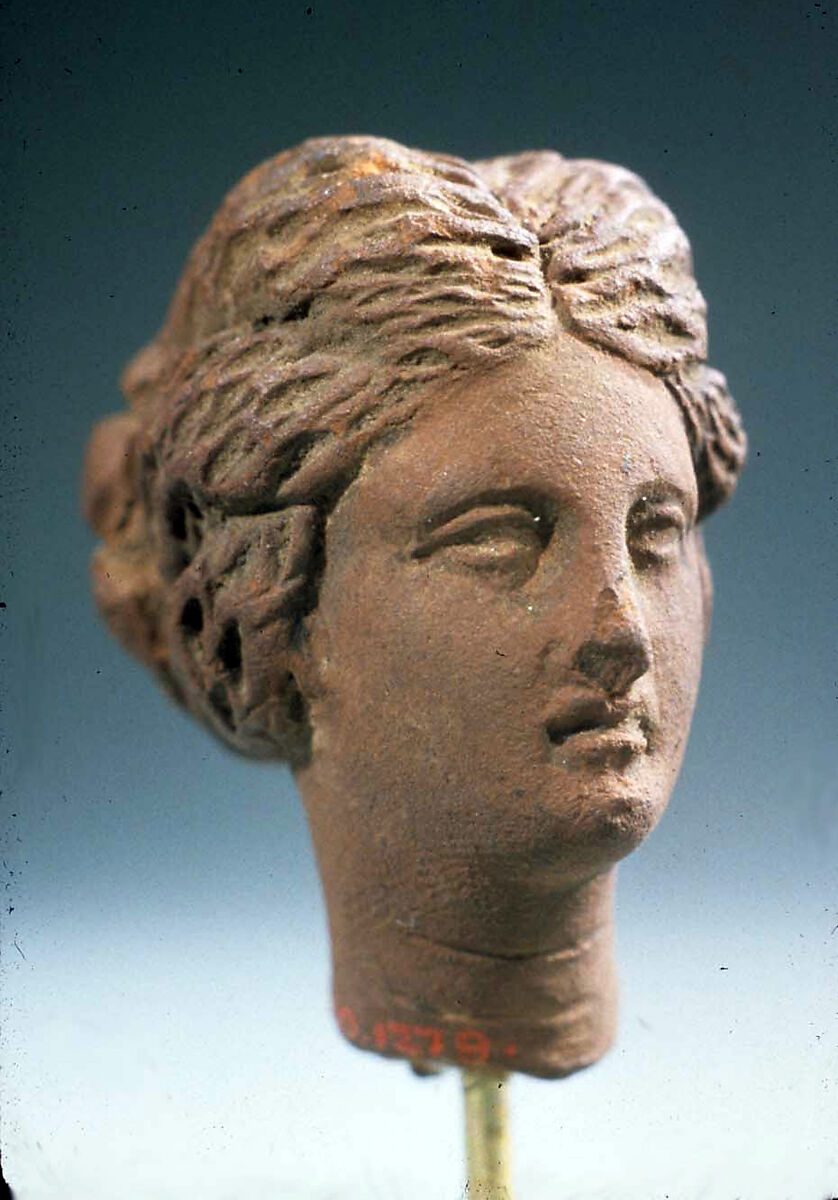 Head of a woman, Pottery