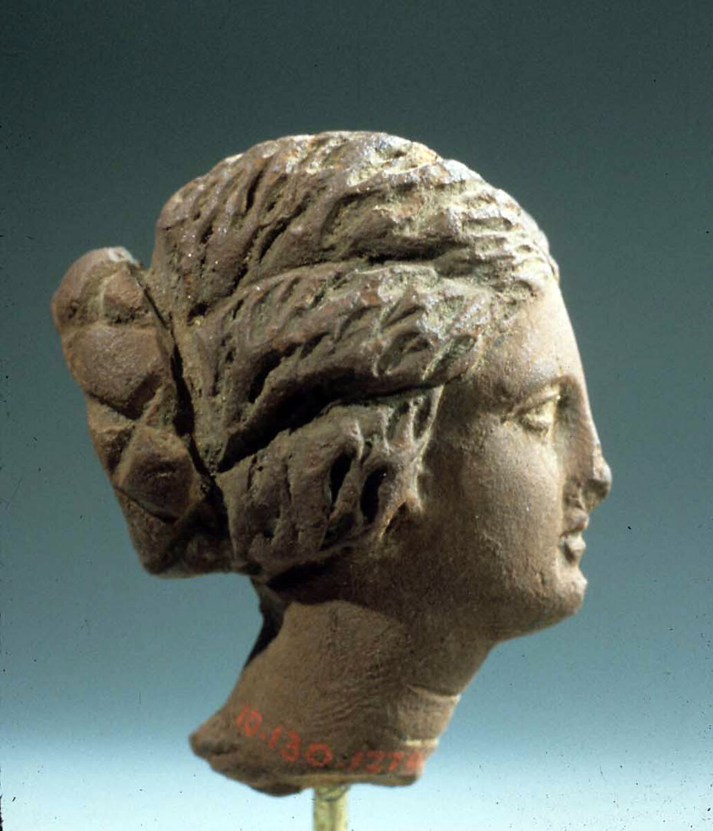 Head of a woman, Pottery