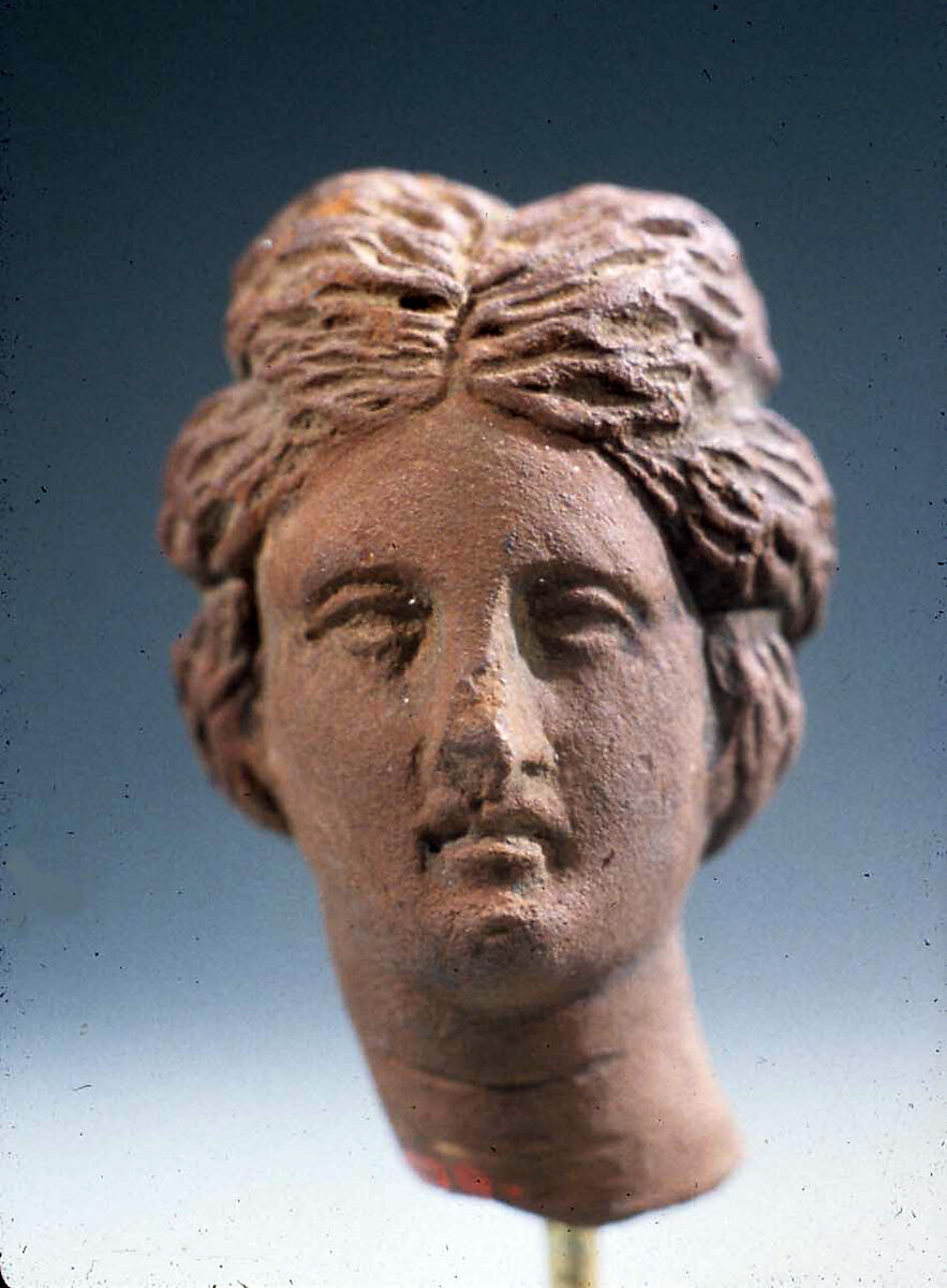 Head of a woman, Pottery