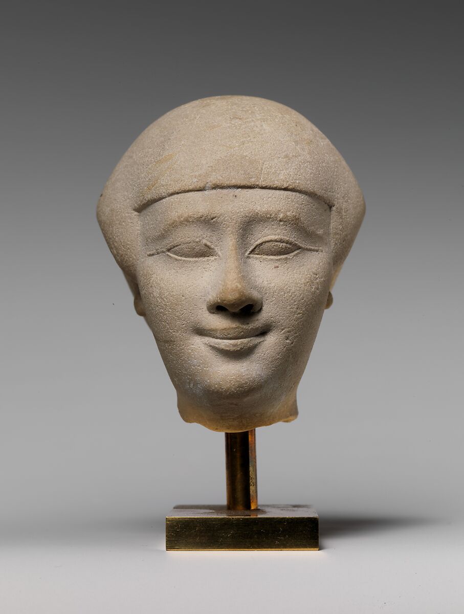 Female head, Limestone, paint