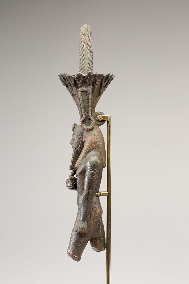 Nefertum, cupreous metal, black bronze and precious metal inlay, glass