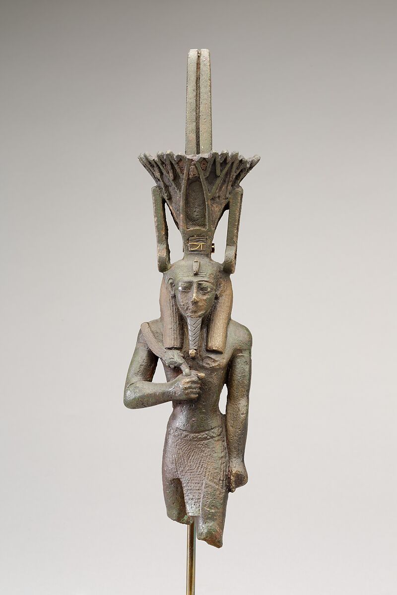 Nefertum, cupreous metal, black bronze and precious metal inlay, glass