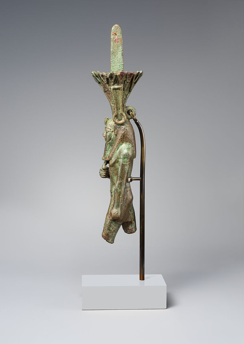 Nefertum, cupreous metal, black bronze and precious metal inlay, glass