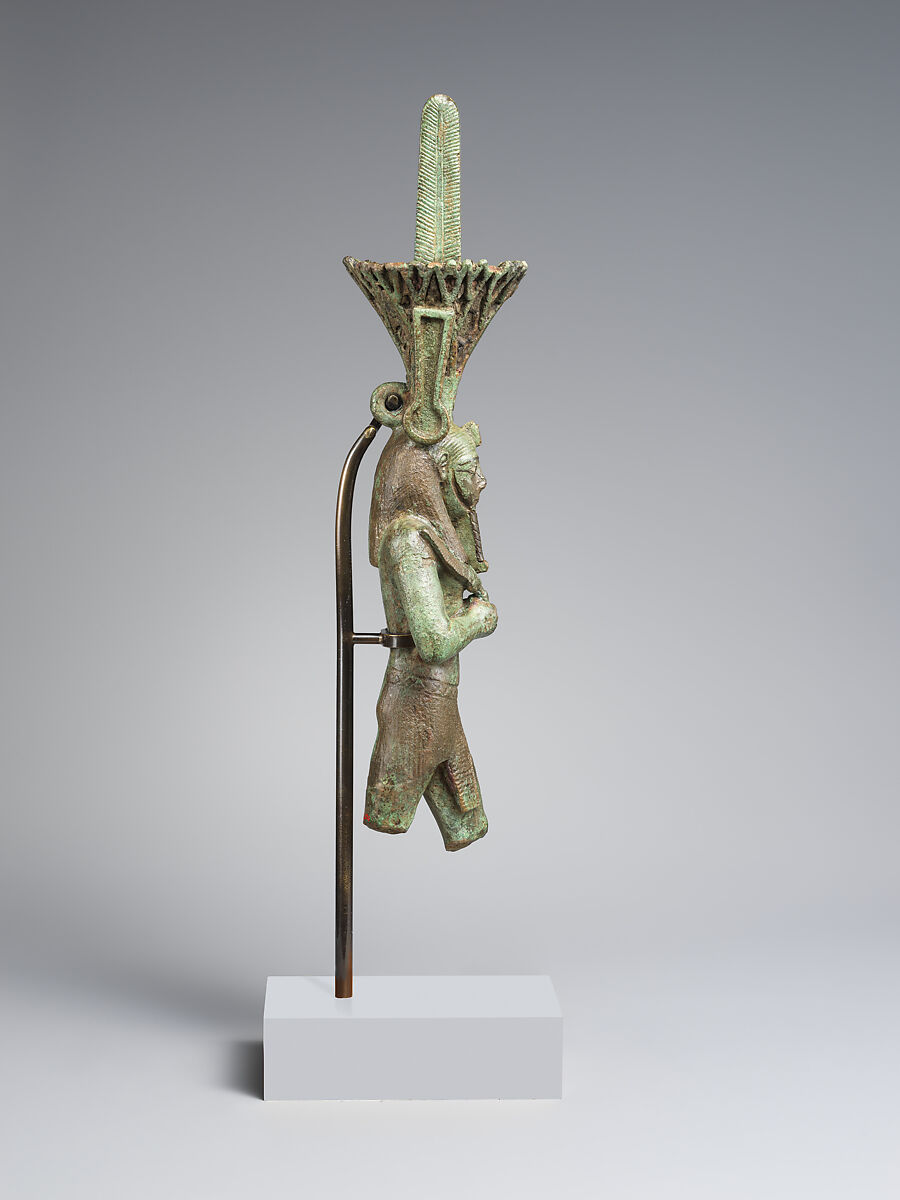 Nefertum, cupreous metal, black bronze and precious metal inlay, glass