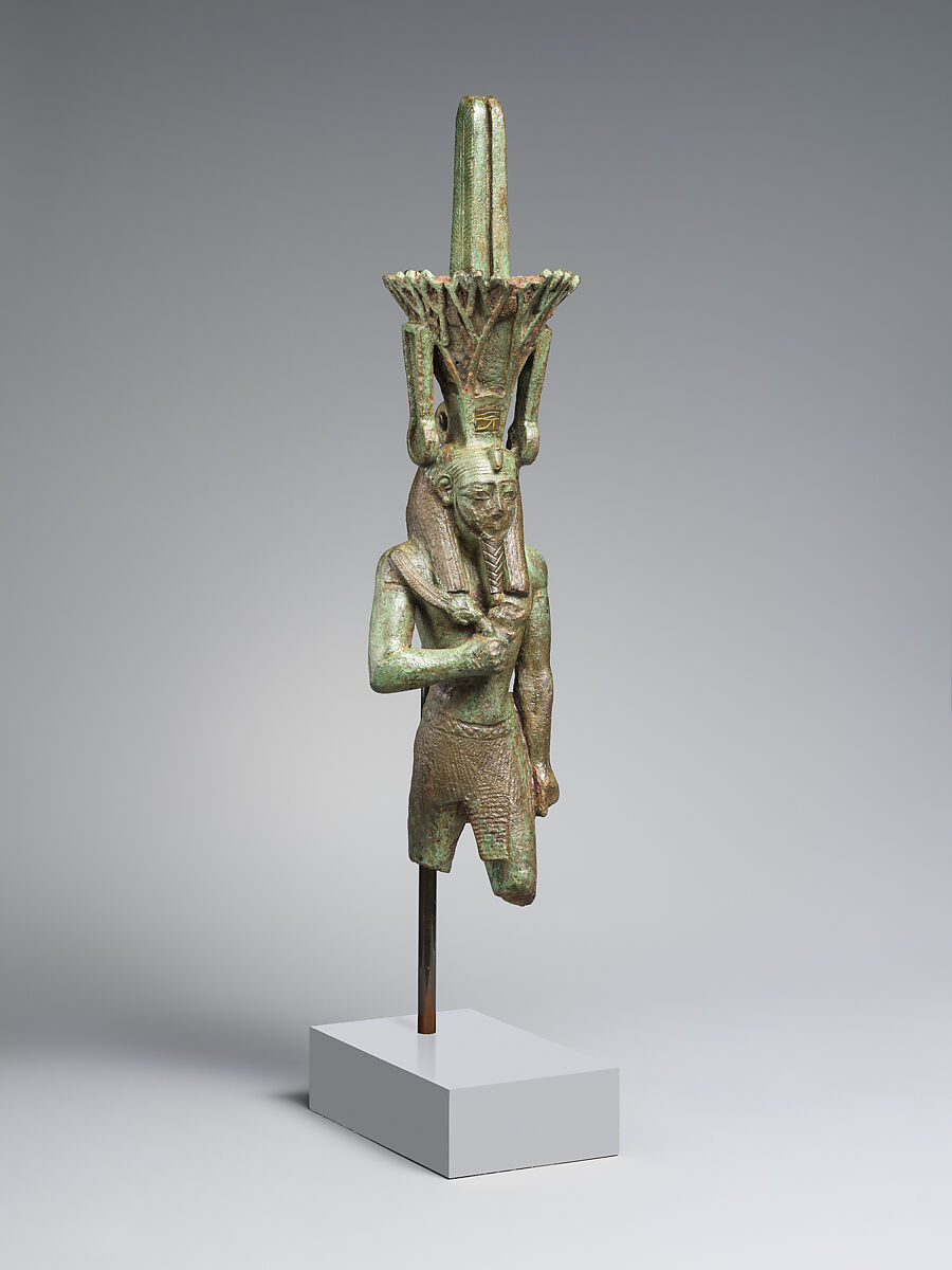 Nefertum, cupreous metal, black bronze and precious metal inlay, glass