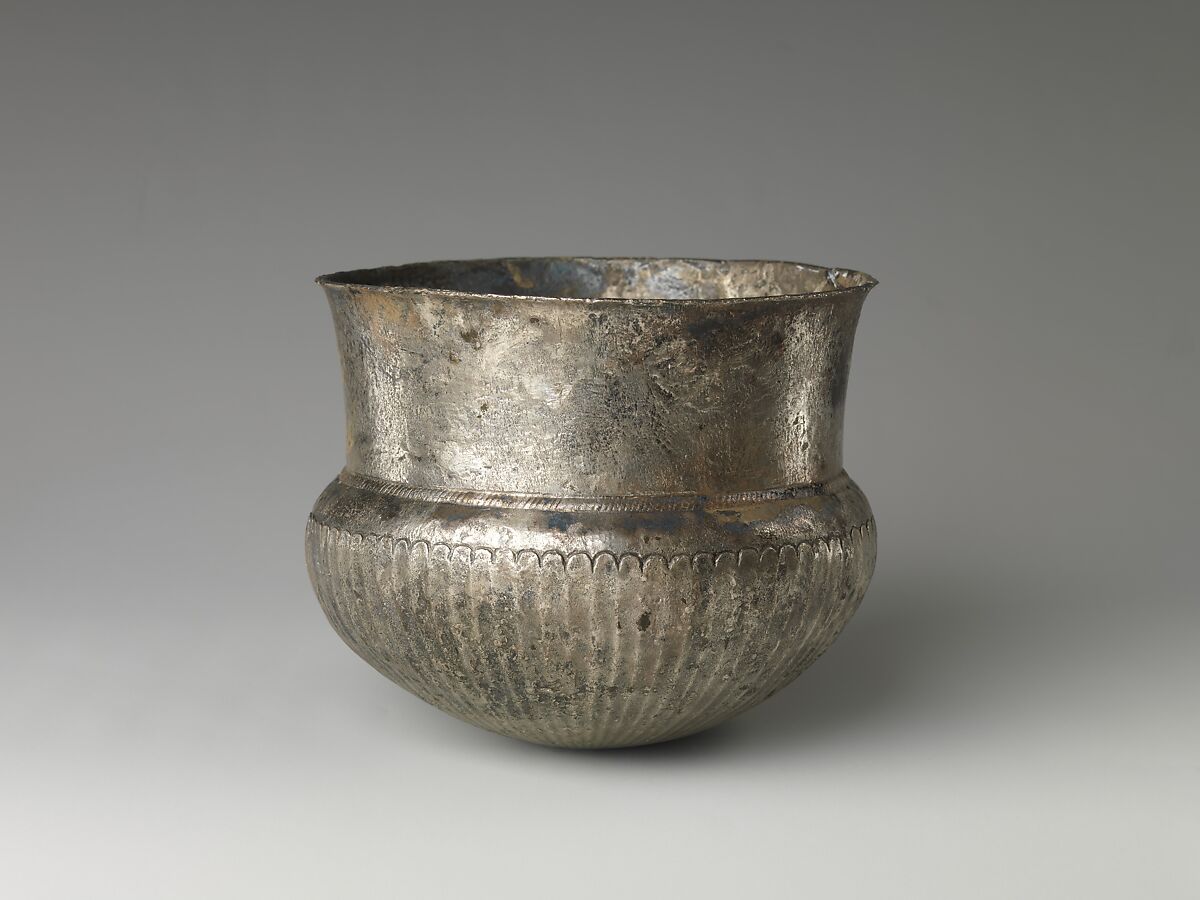 Bowl with flutes from shoulder to rosette at base and with inscribed weight, Silver 