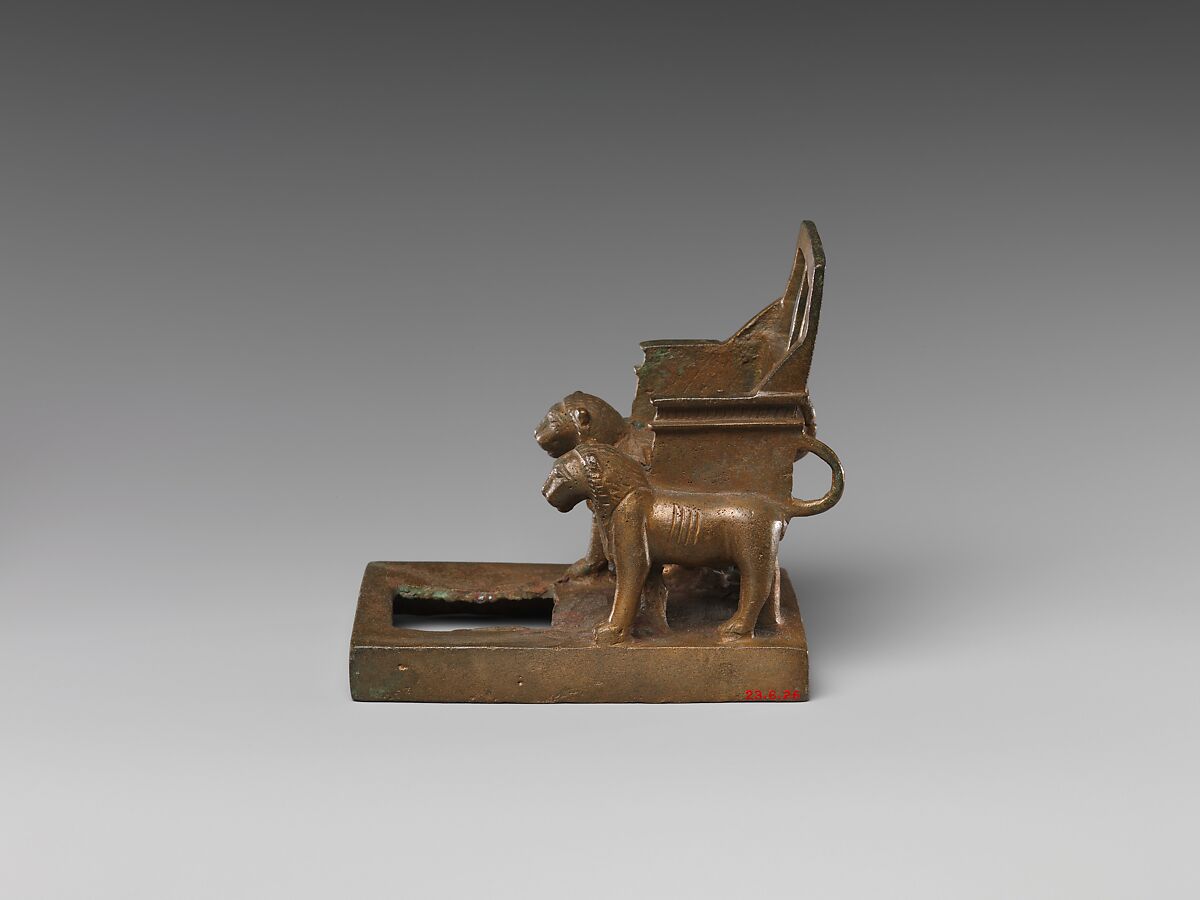 God's throne supported by two striding lions, cupreous metal