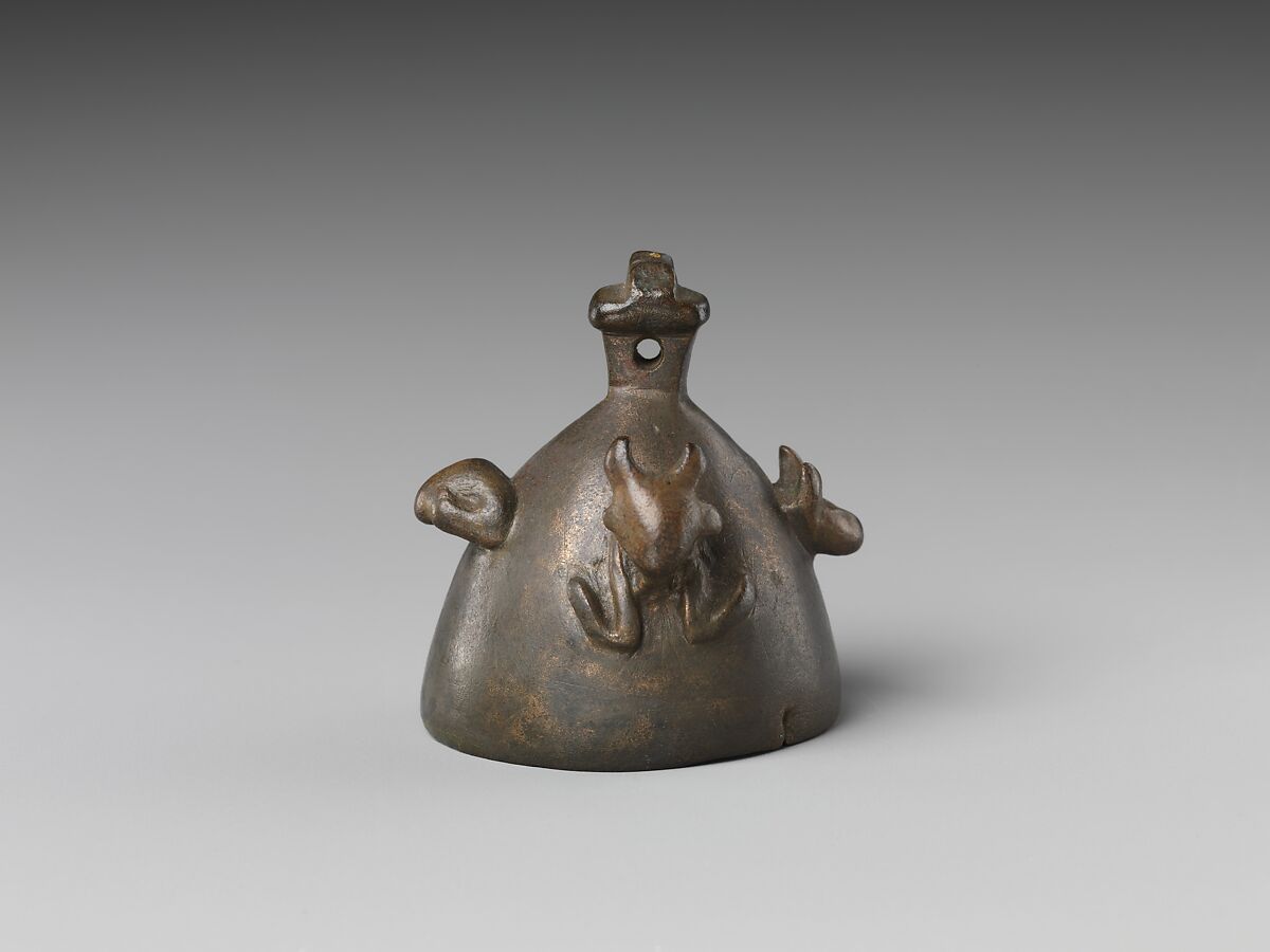 Bell with heads of a ram, a jackal, and a bovine wearing a yoke ending in uraei, Leaded bronze 