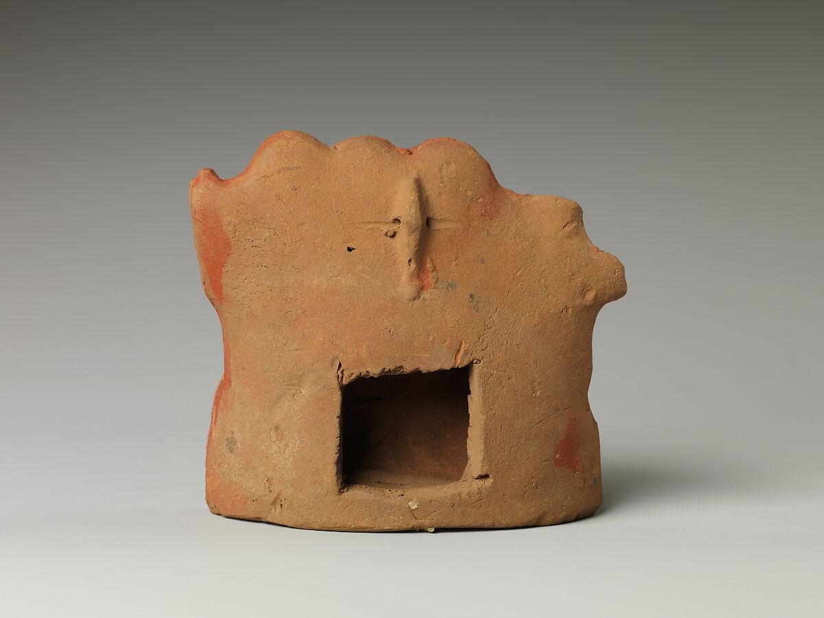 Dancing Bes alongside seated group of musicians, Pottery