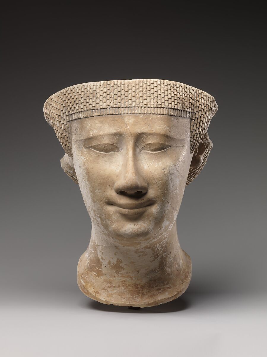 Partial female head, Limestone 