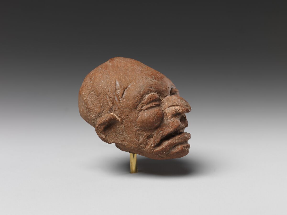 Head of an old man, Pottery