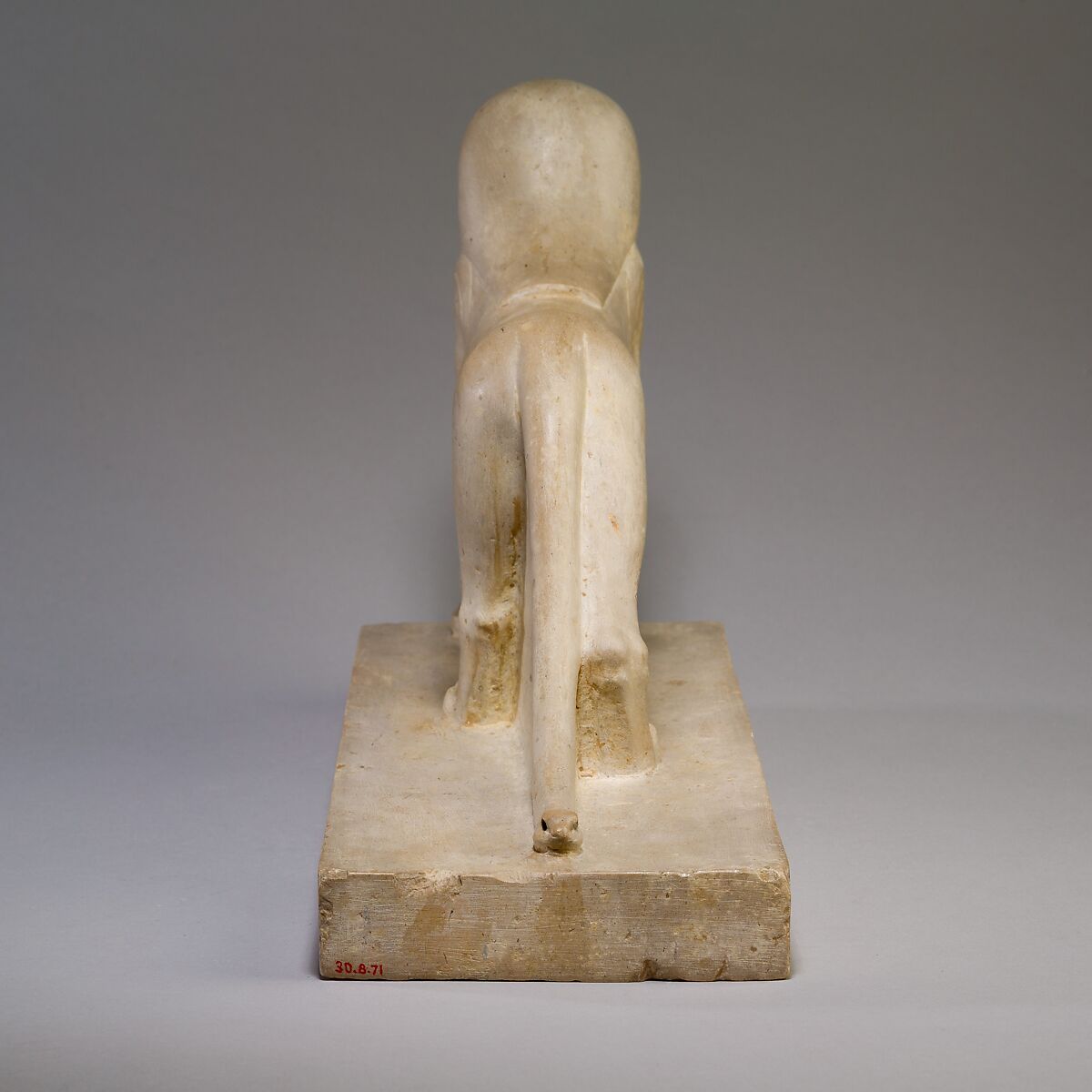 Tutu, limestone, pigment inlay; missing inlay