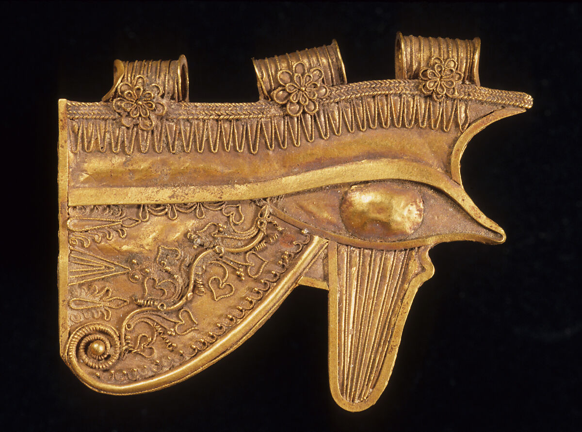 Wedjat eye with granulation and decorative wire ornament, Gold with filigree ornament