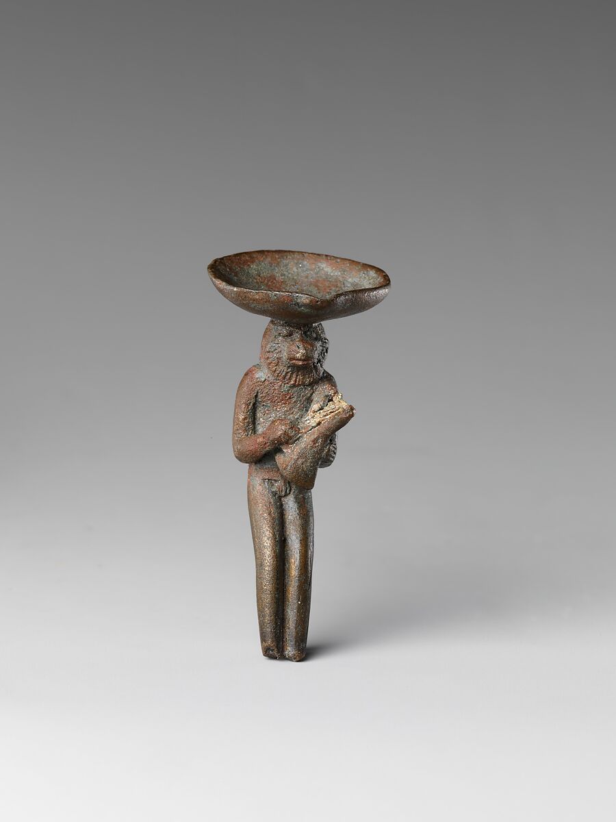 Monkey playing the lyre and carrying a dish on its head, Cupreous metal