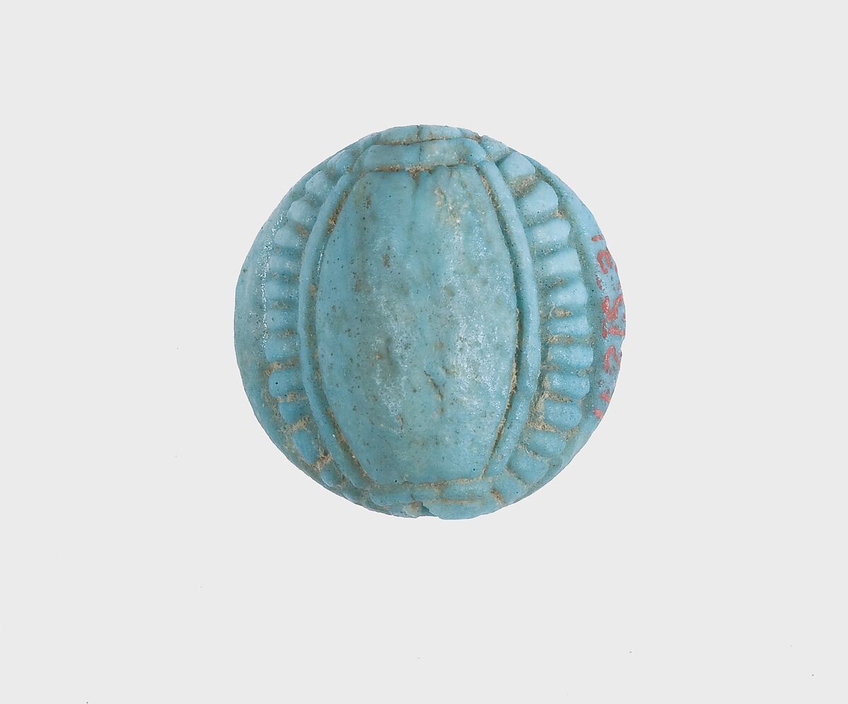 Cowroid Seal Amulet Inscribed with a Rosette, Mica schist, glazed