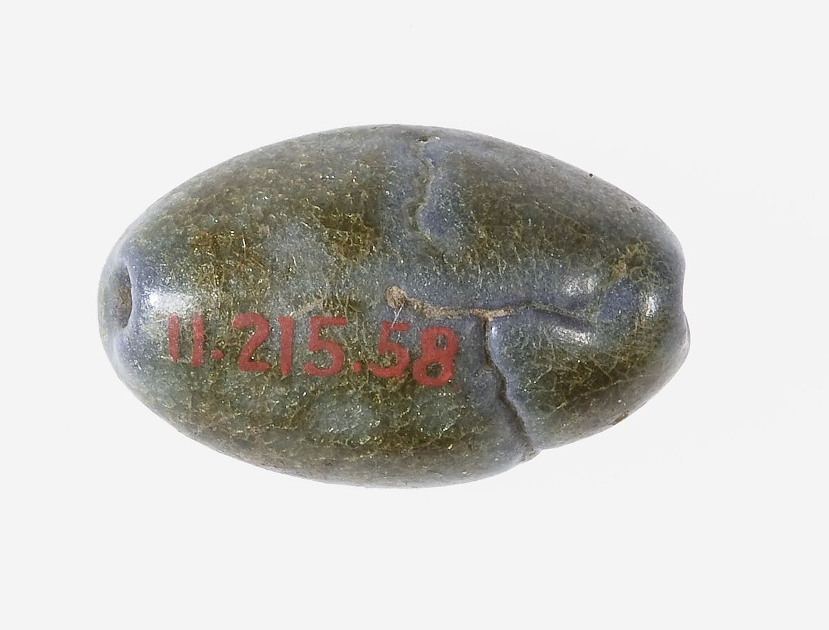 Cowroid Stamp Seal with a Nefer Hieroglyph on the Base, Faience