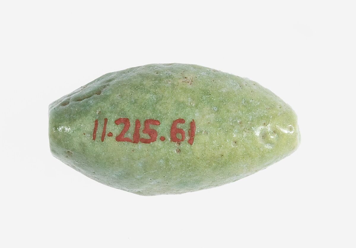 Cowroid Stamp Seal with a Maat Feather Inscribed on the Base, Faience