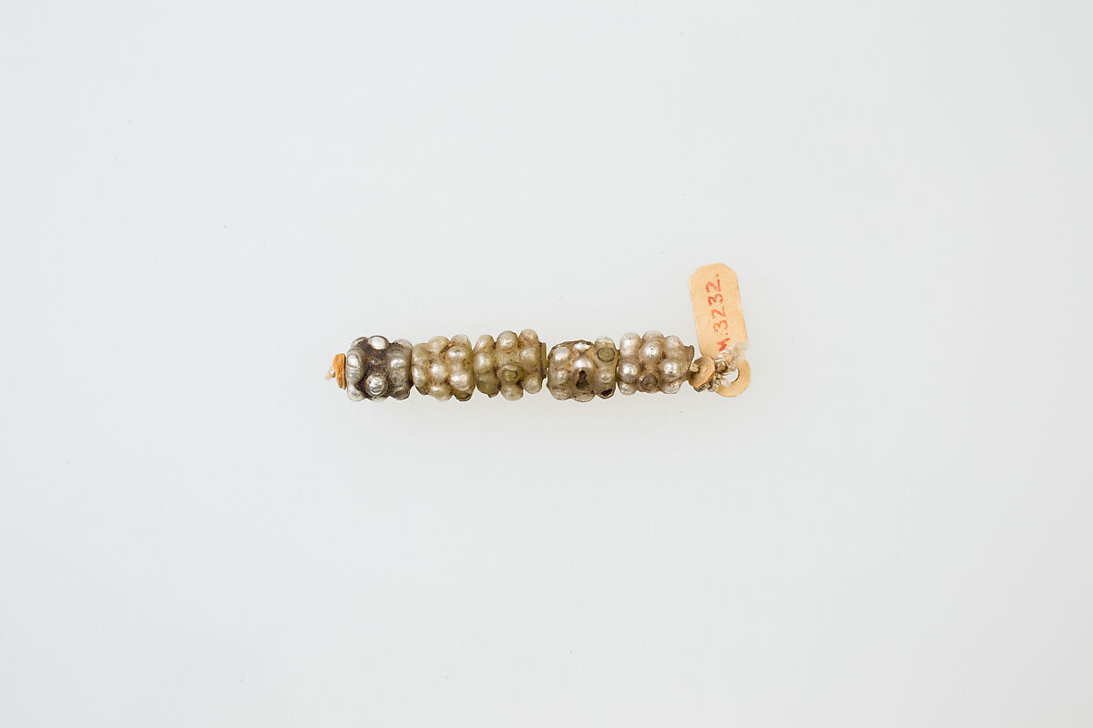 String of 5 knobbed beads, glass, gold foil 
