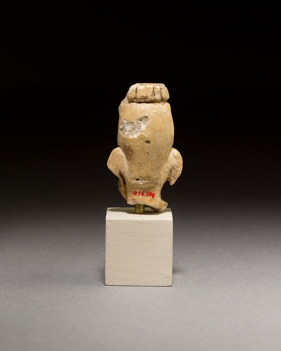 Upper part of a statuette of the Mother of the Apis, Yellow faience