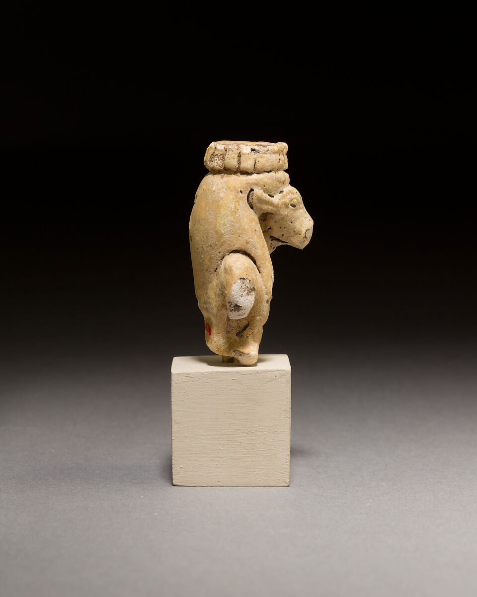 Upper part of a statuette of the Mother of the Apis, Yellow faience