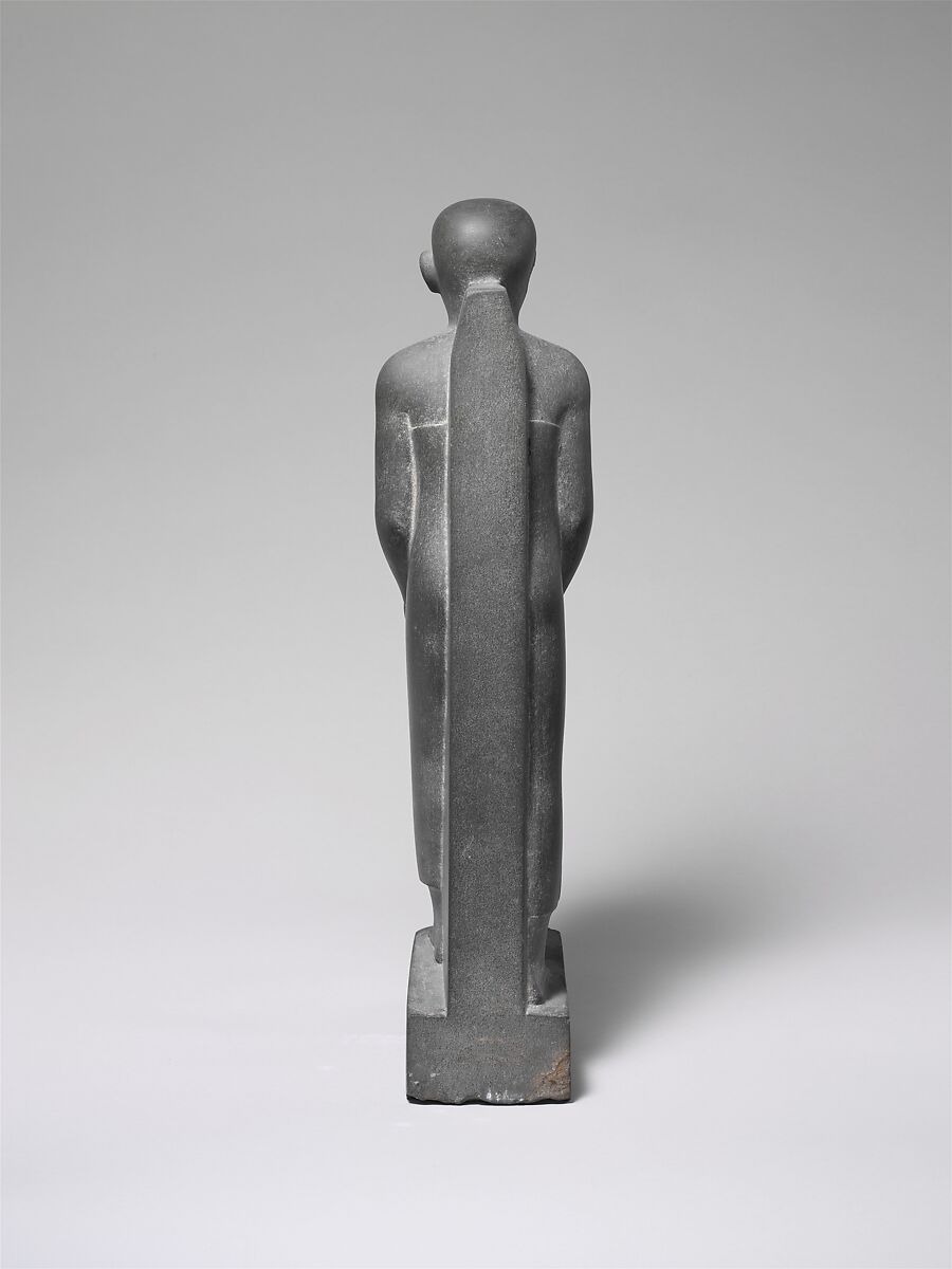 Man Holding a Shrine Containing an Image of Osiris, Greywacke