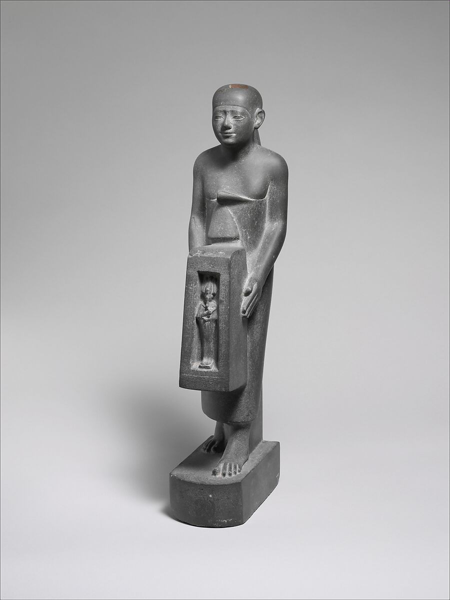 Man Holding a Shrine Containing an Image of Osiris, Greywacke 