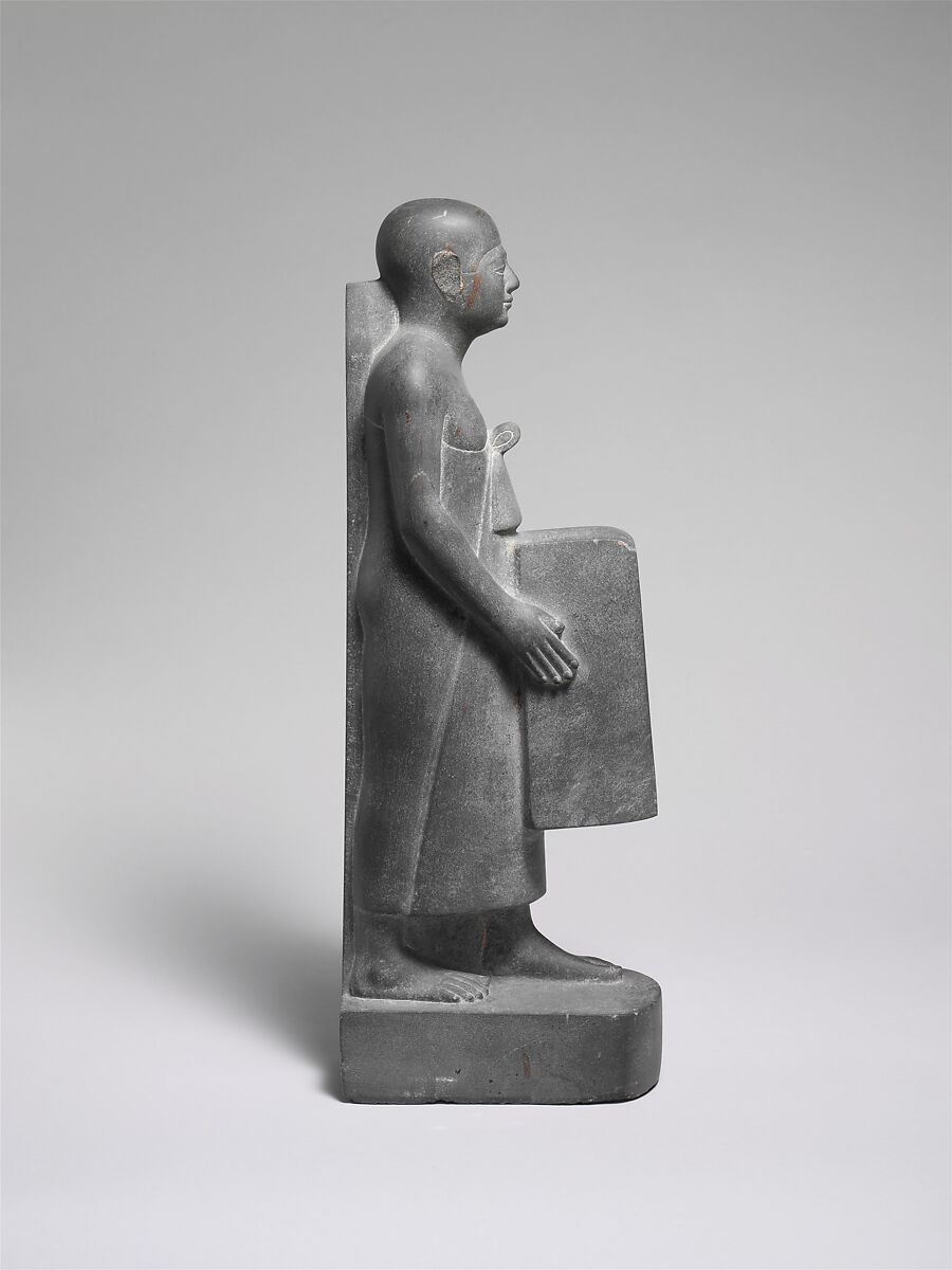 Man Holding a Shrine Containing an Image of Osiris, Greywacke