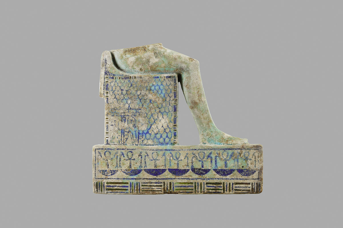 Lower part of inlay of enthroned mummiform god, Faience, Paste 