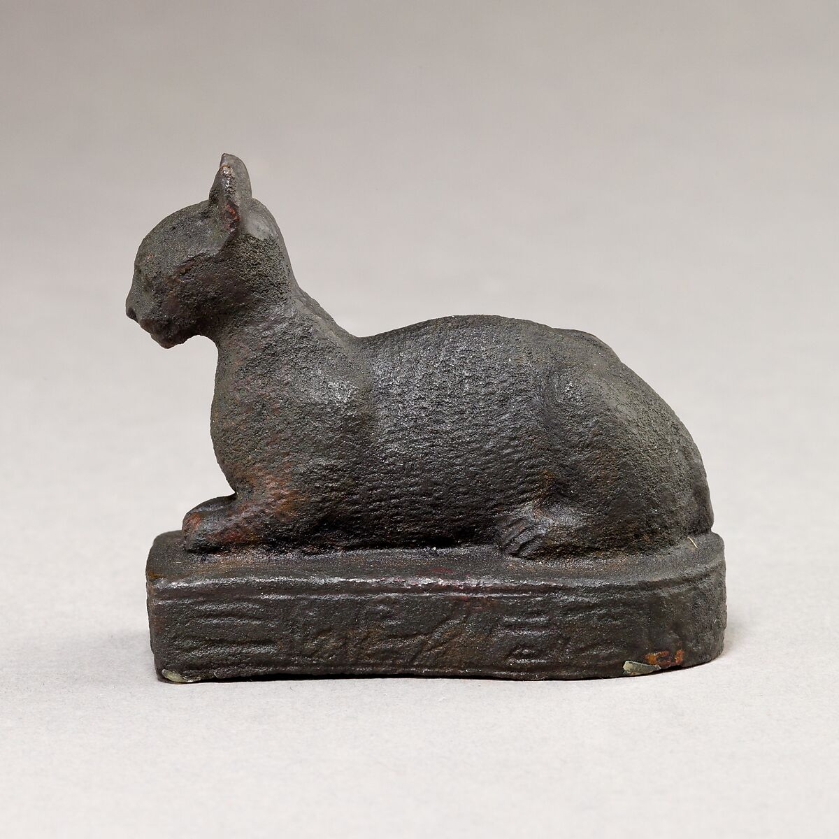 Cat on base inscribed for Bastet and an offerer, Cupreous metal