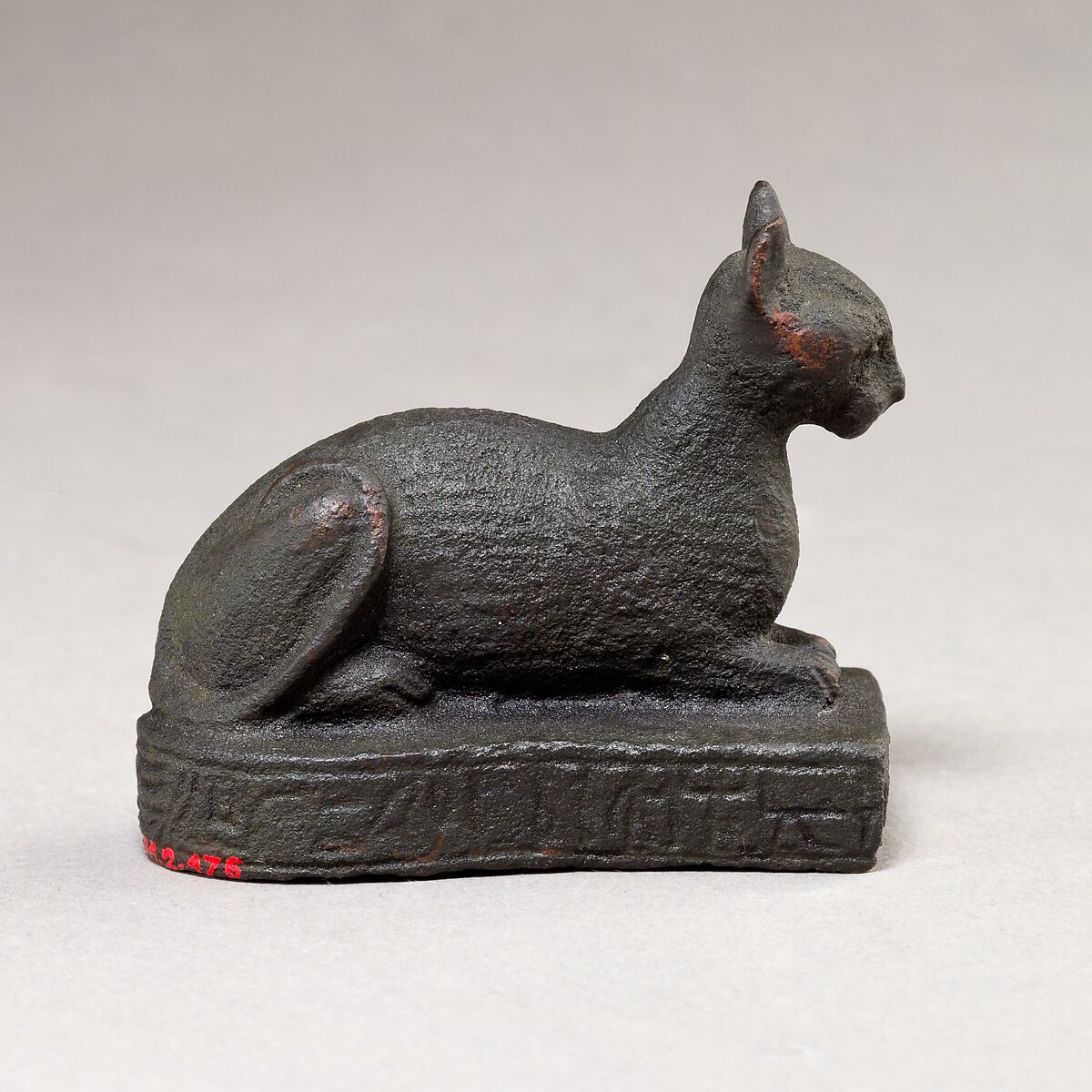 Cat on base inscribed for Bastet and an offerer, Cupreous metal