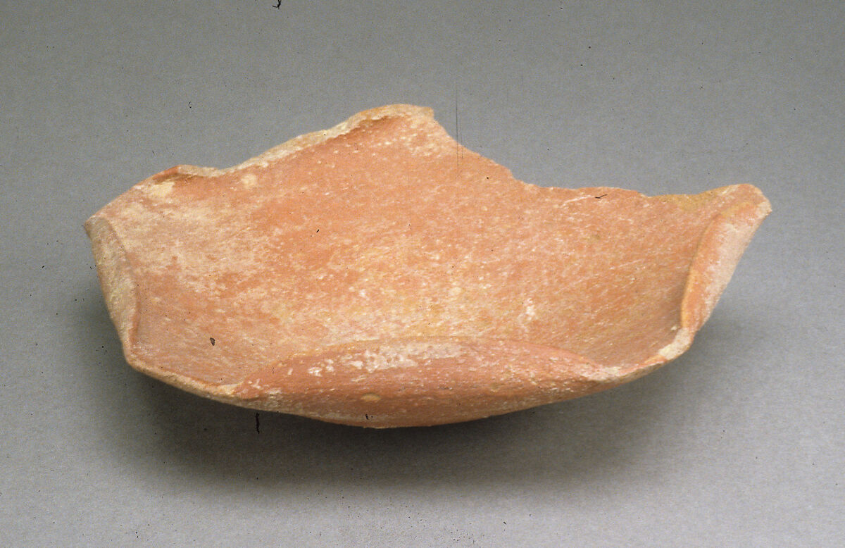 Dish with a folded rim, Pottery, hematite wash 