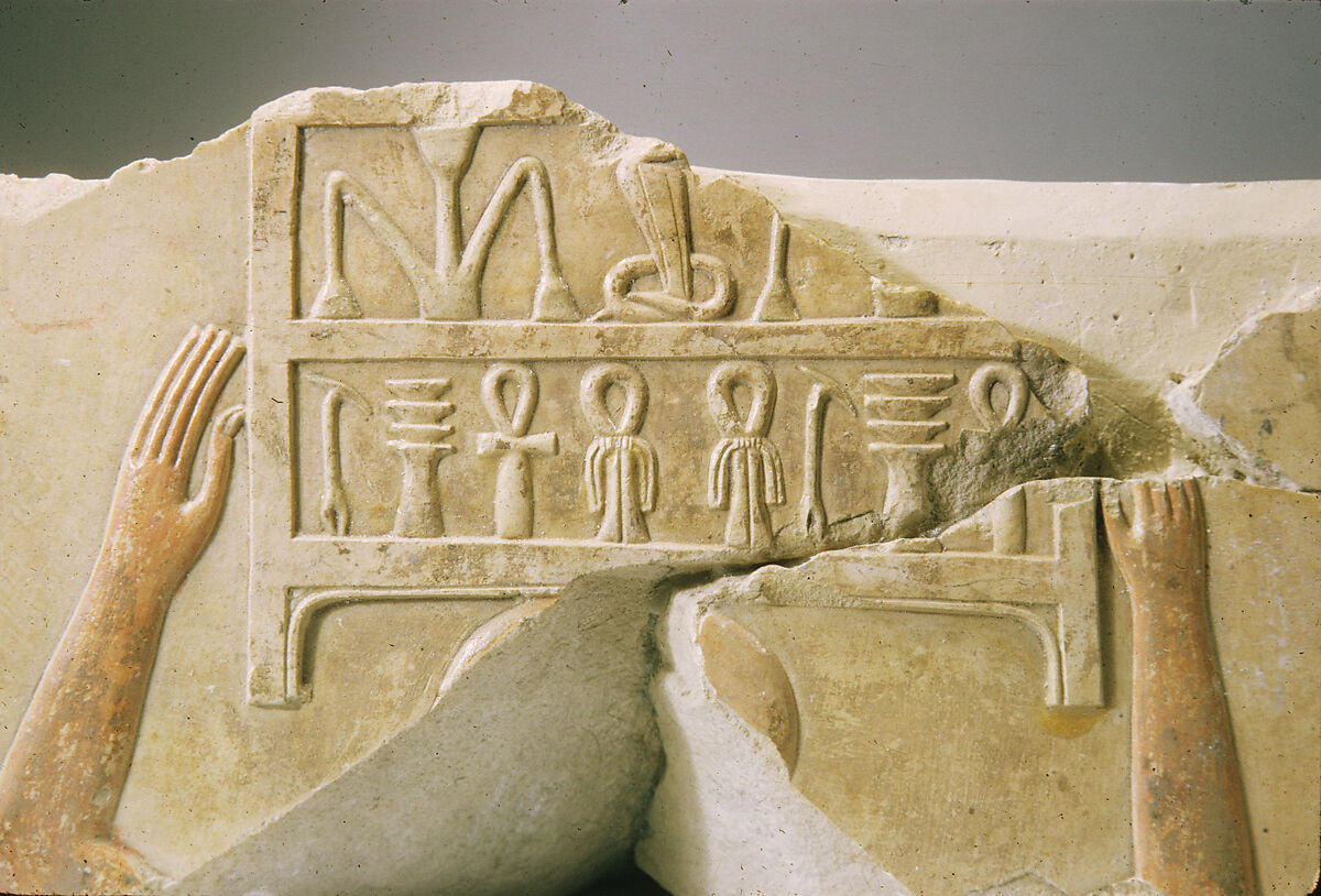 Relief of offering bearers carrying boxes, Limestone, paint