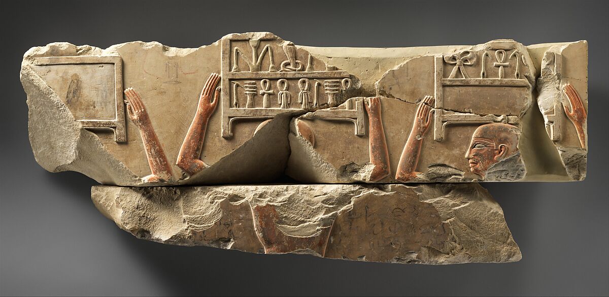 Relief of offering bearers carrying boxes, Limestone, paint