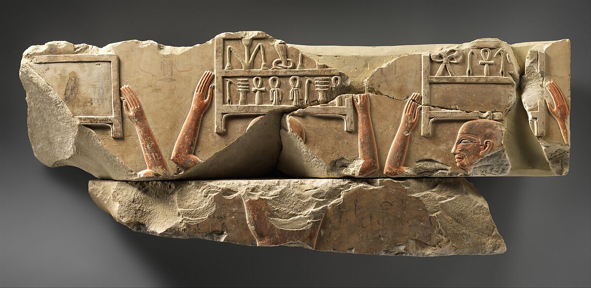 Relief of offering bearers carrying boxes, Limestone, paint 