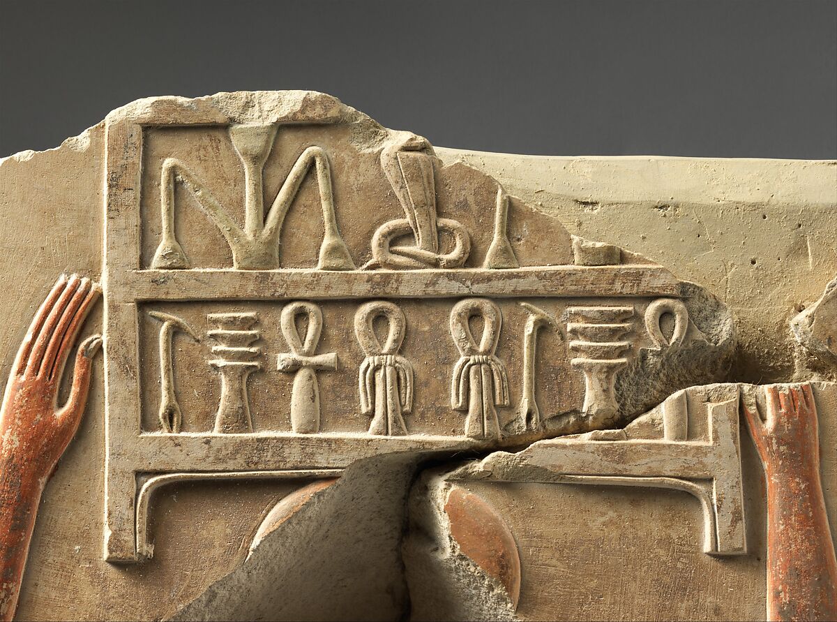 Relief of offering bearers carrying boxes, Limestone, paint