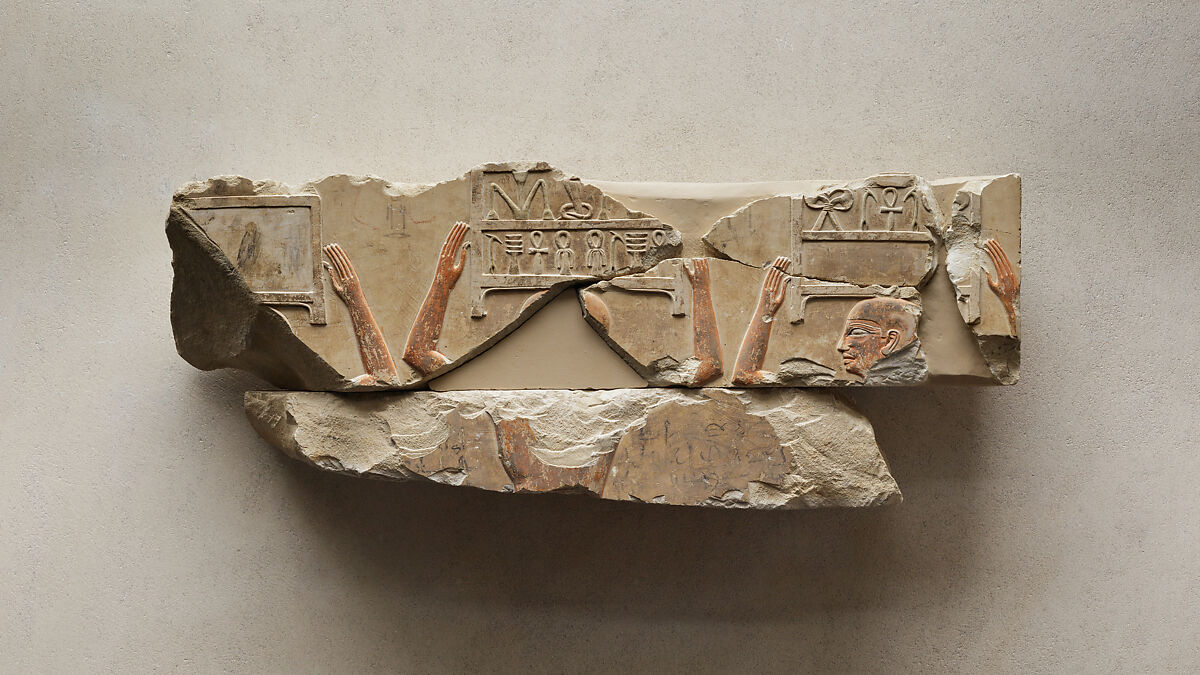 Relief of offering bearers carrying boxes, Limestone, paint