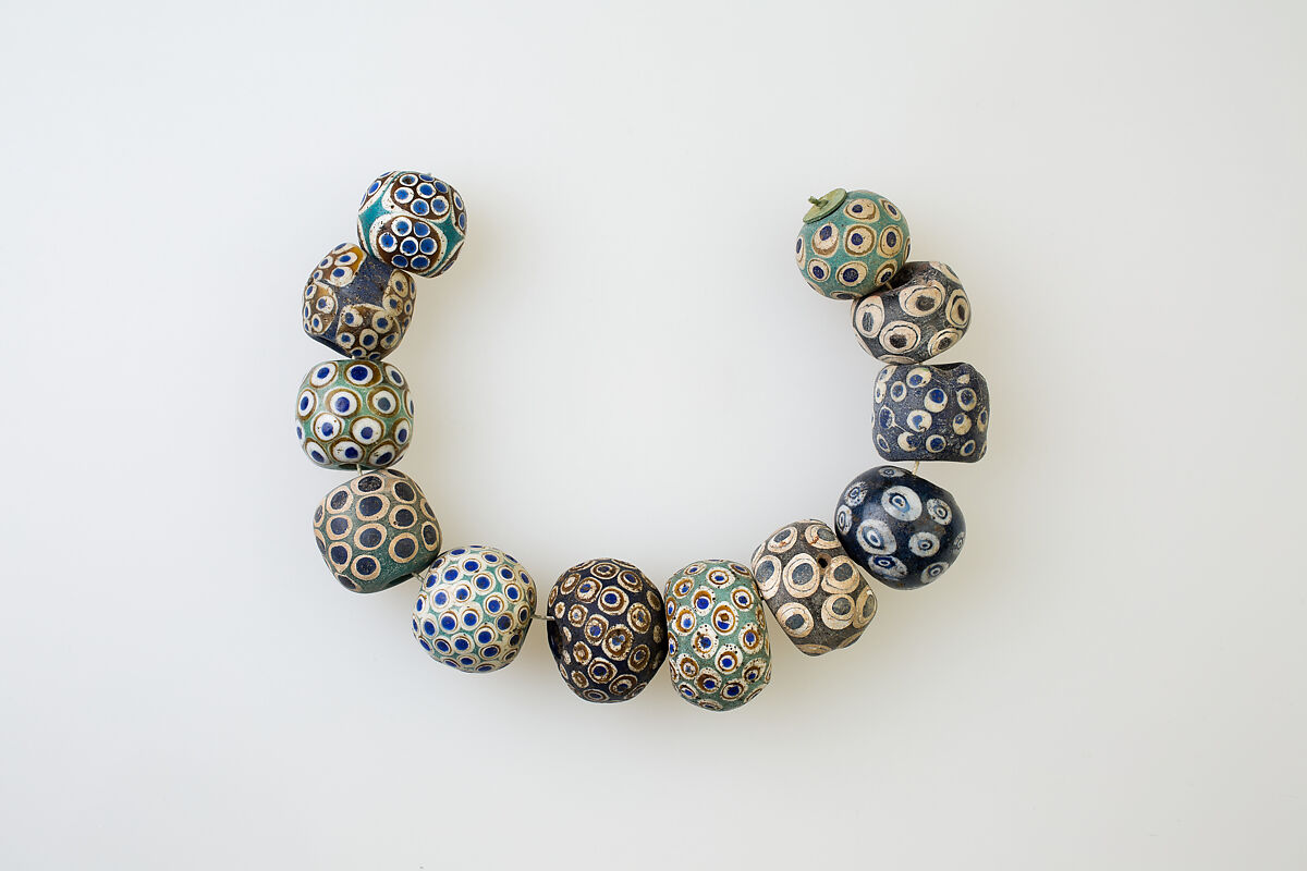 String of 12 Eye Beads, Glass 
